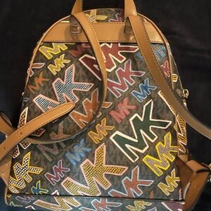 Michael Kors colorful back pack, looks new. Only used for a short time.
